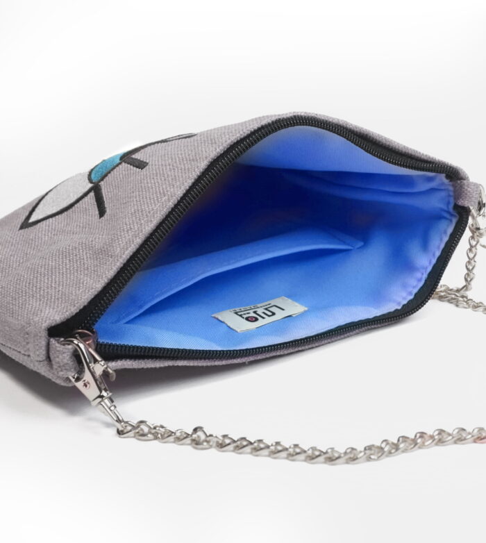Interior showcase of design and quality fabricated grey cross bag